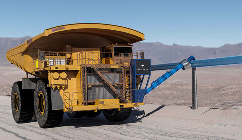 BluVeinXL charging system connecting large mining truck to blue e-rail.