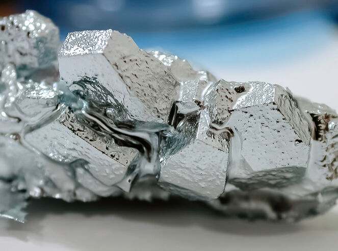 Closeup of silver-colored gallium in its crystallized form.