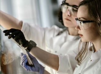 Two female scientists in a laboratory.