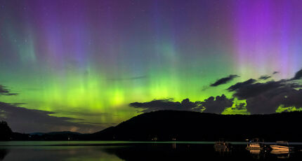 Aurora borealis over a lake in New Hampshire.