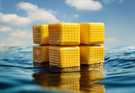 Rendering of 3D printed yellow filter cubes on water.