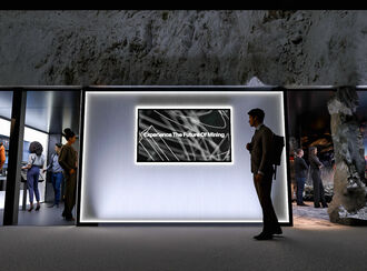 Display reads “Experience The Future Of Mining” at immersive room entrance.