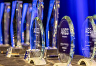 A table full of 2024 ARBS awards for HVAC industry.